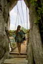 Happy young woman on the bridge in sentosa island, singapore Royalty Free Stock Photo