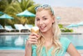 Happy young woman in sunglasses eating ice cream Royalty Free Stock Photo