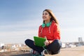 Happy young woman with tablet pc and headphones Royalty Free Stock Photo