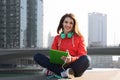 Happy young woman with tablet pc and headphones Royalty Free Stock Photo