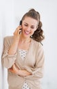 Happy young woman talking cell phone Royalty Free Stock Photo