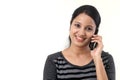 Happy young woman talking on mobile phone