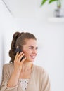 Happy young woman talking mobile phone Royalty Free Stock Photo