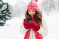 Happy young woman with tea cup in winter park Royalty Free Stock Photo