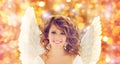 Happy young woman or teen girl with angel wings Royalty Free Stock Photo