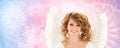 Happy young woman or teen girl with angel wings Royalty Free Stock Photo