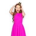 Happy young woman or teen girl in pink dress Royalty Free Stock Photo