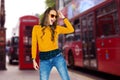 Happy young woman or teen over london city street Royalty Free Stock Photo