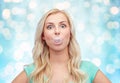 Happy young woman or teenage girl chewing gum Royalty Free Stock Photo