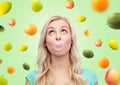 Happy young woman or teenage girl chewing gum Royalty Free Stock Photo