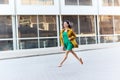 Happy young woman or teenage girl on city street Royalty Free Stock Photo