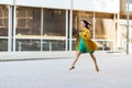 Happy young woman or teenage girl on city street Royalty Free Stock Photo