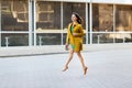 Happy young woman or teenage girl on city street Royalty Free Stock Photo