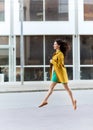 Happy young woman or teenage girl on city street Royalty Free Stock Photo