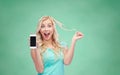 Happy young woman or teenage girl with smartphone Royalty Free Stock Photo