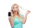 Happy young woman or teenage girl with smartphone Royalty Free Stock Photo