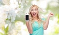 Happy young woman or teenage girl with smartphone Royalty Free Stock Photo