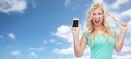 Happy young woman or teenage girl with smartphone Royalty Free Stock Photo