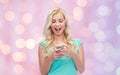 Happy young woman or teenage girl with smartphone Royalty Free Stock Photo