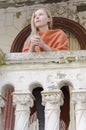 Happy young woman on terrace