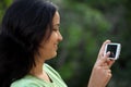 Happy young woman text messaging Royalty Free Stock Photo