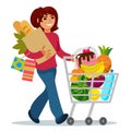 Woman with a shopping cart buying food Royalty Free Stock Photo