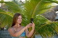 Happy young woman makes selfie on the beach Royalty Free Stock Photo