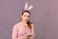 Happy young woman wearing bunny ears Royalty Free Stock Photo
