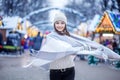 Happy young woman wearing a hat and a scarf. Concept Lifestyle, Urban, Winter, Vacation, Happy Christmas, New Year