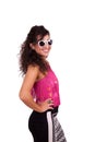 Happy young woman wearing sunglasses and posing