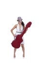 Happy young woman wearing sunglasses posing with guitar