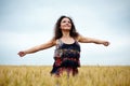 Happy young woman in wheat field Royalty Free Stock Photo