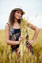 Happy young woman in wheat field Royalty Free Stock Photo