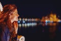 Happy young woman wondering in Budapest night panorama portrait Royalty Free Stock Photo