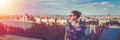 Happy young woman wondering in Budapest sunset panorama, Hungary