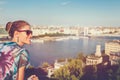 Happy young woman wondering in city panorama Budapest, Hungary