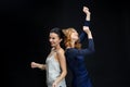 Happy young women dancing at night club disco Royalty Free Stock Photo