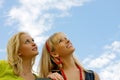 Happy young women friends smiling Royalty Free Stock Photo