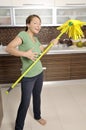 happy young women fun cleaning