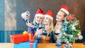 Happy young women having fun taking a selfie during Christmas party at restaurant Royalty Free Stock Photo