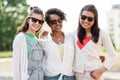 Happy young women in sunglasses outdoors Royalty Free Stock Photo