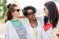 Happy young women in sunglasses outdoors Royalty Free Stock Photo