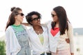 Happy young women in sunglasses outdoors Royalty Free Stock Photo