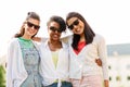 Happy young women in sunglasses outdoors Royalty Free Stock Photo