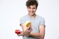 Happyman holding apple and donut