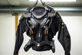 haptic feedback suit for vr gaming, hanging on a hanger