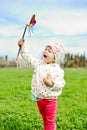 Hapy girl with windmill