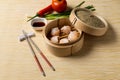 HAR GOW in bamboo steamer with sauces and chopsticks. Chinese Traditional cuisine concept. Dumplings Dim Sum in bamboo steamer Royalty Free Stock Photo