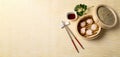 HAR GOW in bamboo steamer with sauces and chopsticks. Chinese Traditional cuisine concept. Dumplings Dim Sum in bamboo steamer Royalty Free Stock Photo