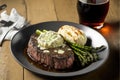 Har-grilled ribeye with mashed potatoes & asparagus and a glass of red wine. Generative AI Royalty Free Stock Photo
